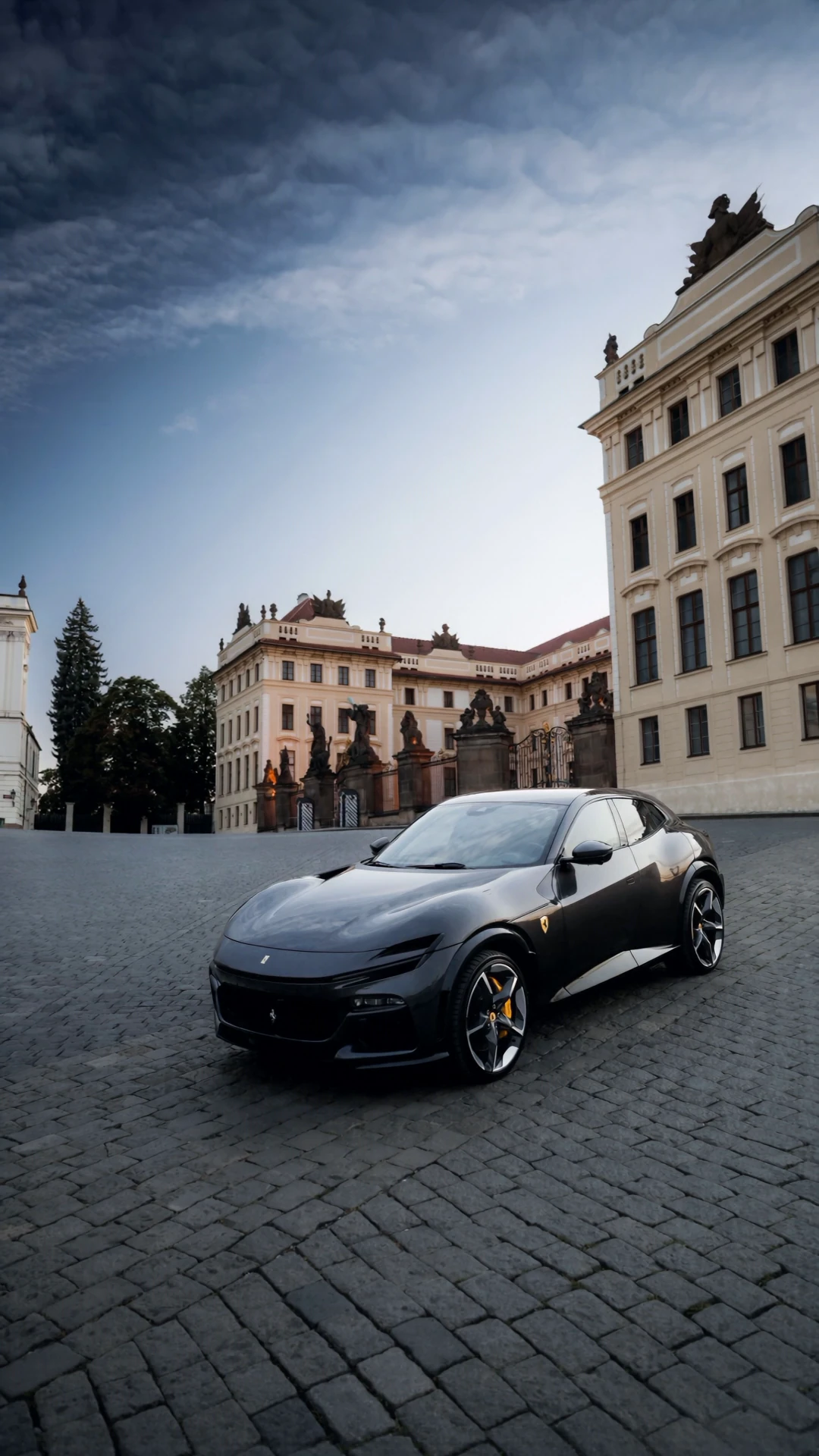 Ferrari Purosangue on the square before the gates of Prague Castle